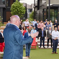 Speaker from Stage & Audience in Courtyard at District 121